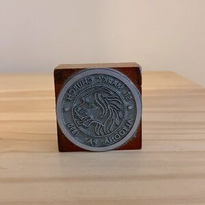 Vintage letterpress block with image of a lion.